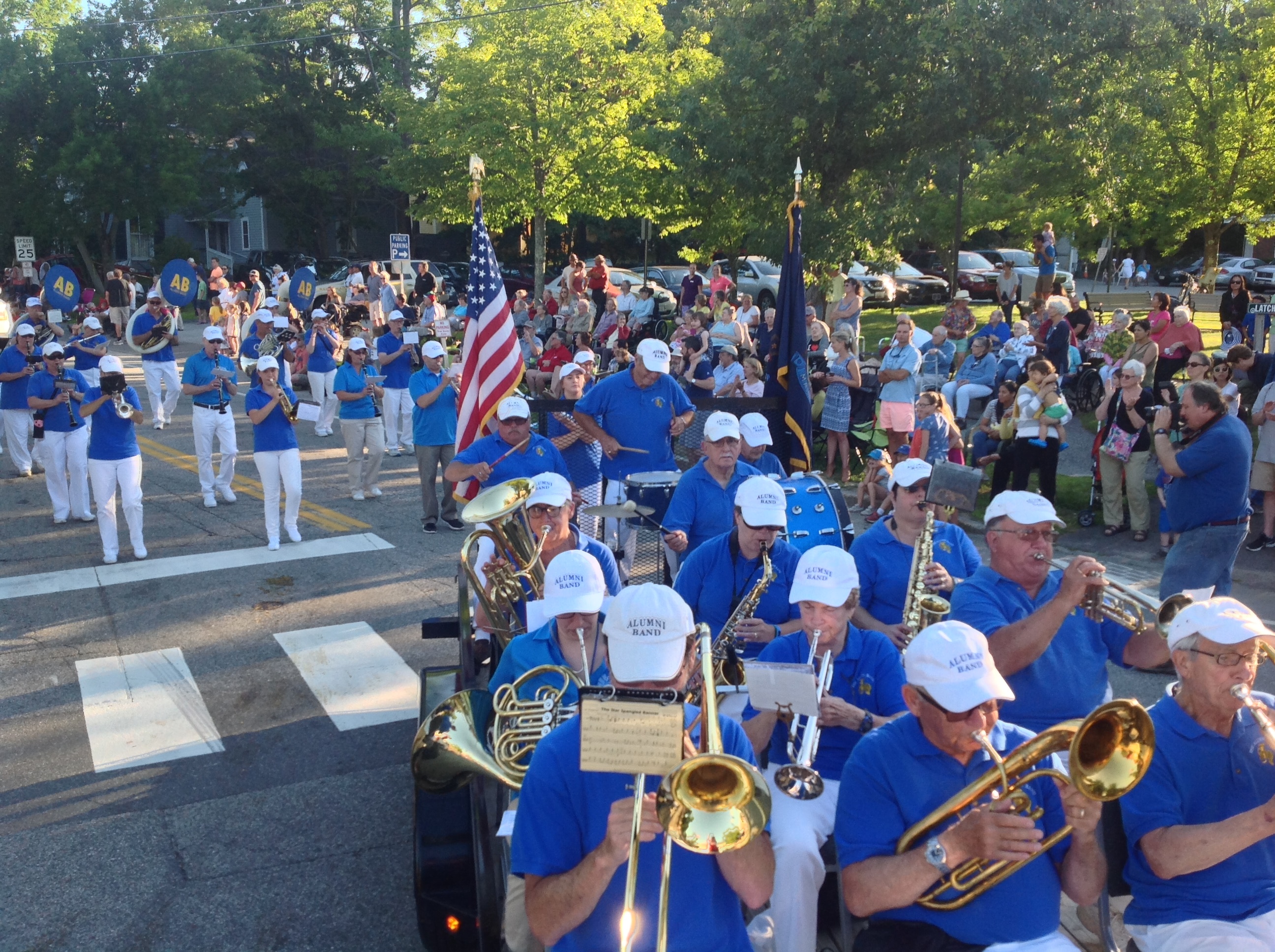Alumni Band members performing at an outdoor event in Southern Maine